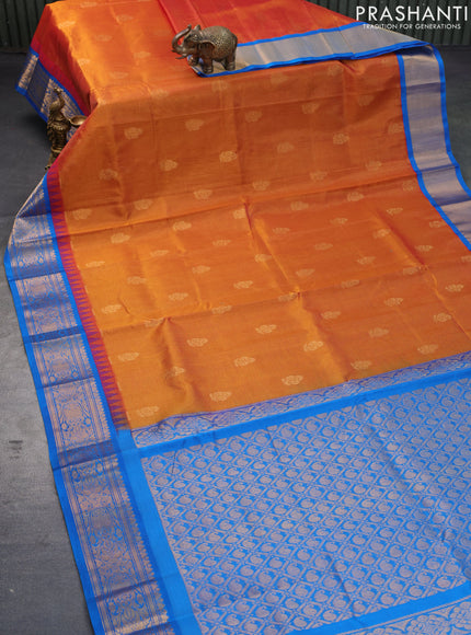 Kuppadam silk cotton saree dual shade of mustard and cs blue with allover zari weaves & buttas and temple design zari woven border