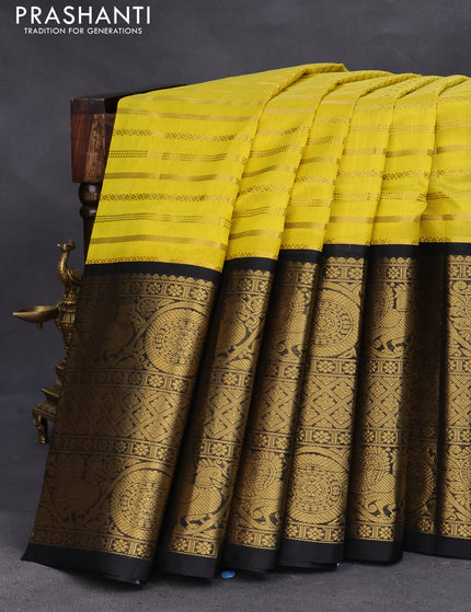 Kuppadam silk cotton saree lime yellow and black with allover zari weaves and long rich annam zari woven border