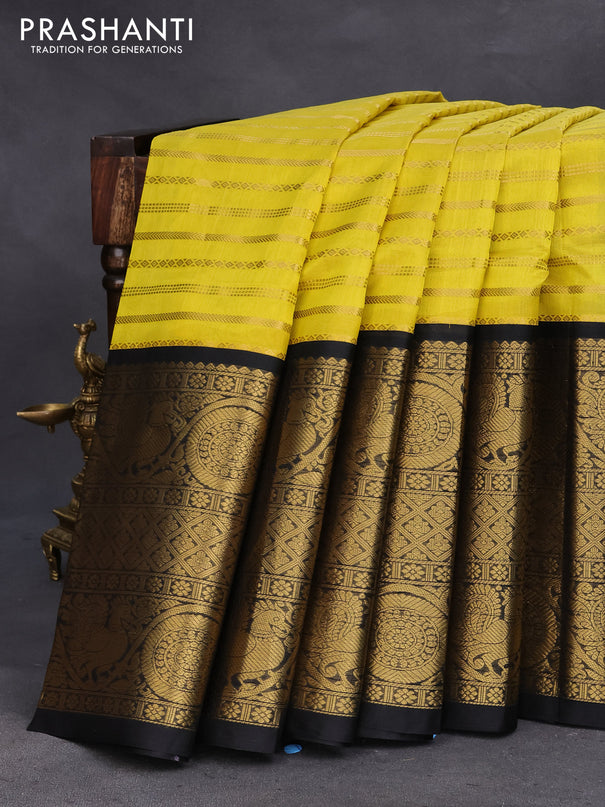 Kuppadam silk cotton saree lime yellow and black with allover zari weaves and long rich annam zari woven border