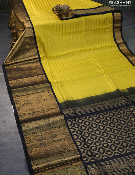 Kuppadam silk cotton saree lime yellow and black with allover zari weaves and long rich annam zari woven border