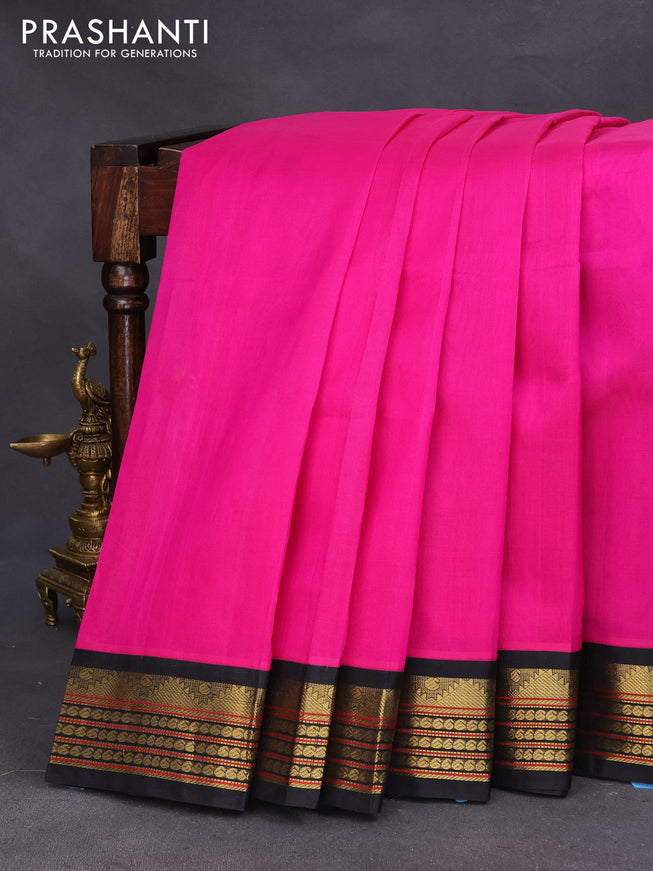 Silk cotton saree pink and black with plain body and zari woven korvai border