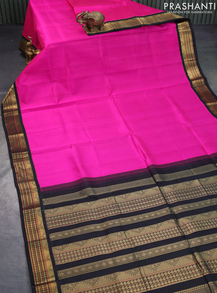 Silk cotton saree pink and black with plain body and zari woven korvai border