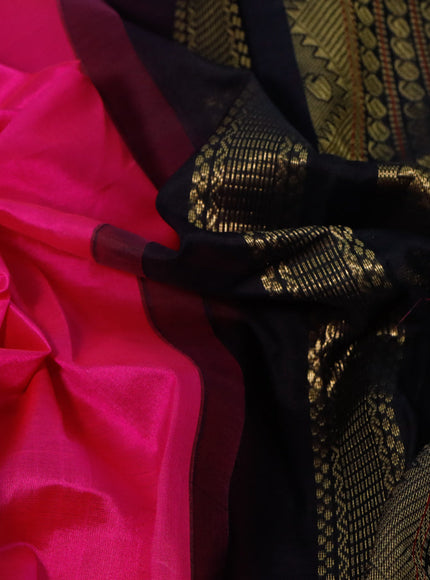 Silk cotton saree pink and black with plain body and zari woven korvai border