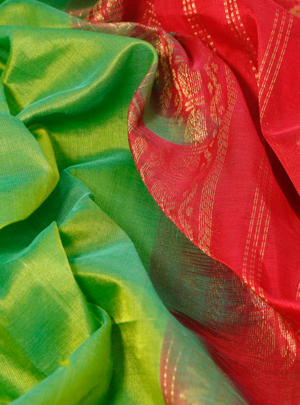 Silk cotton saree light green and red with plain body and zari woven korvai border