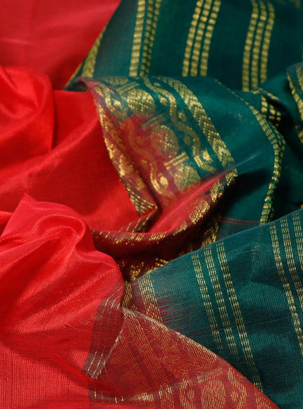 Silk cotton saree red and dark green with plain body and zari woven korvai border