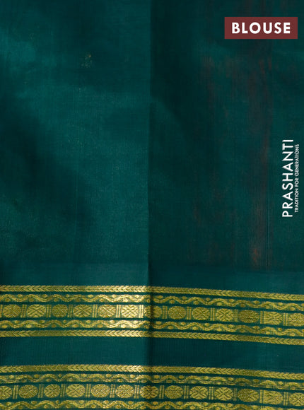 Silk cotton saree red and dark green with plain body and zari woven korvai border