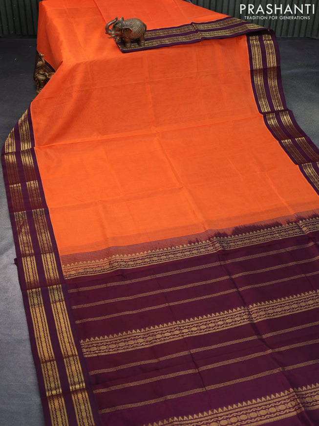 Silk cotton saree orange and wine shade with plain body and zari woven korvai border