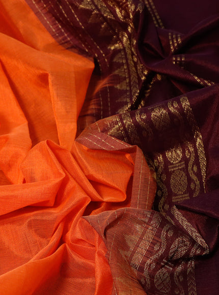 Silk cotton saree orange and wine shade with plain body and zari woven korvai border