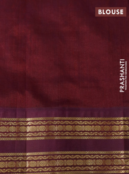 Silk cotton saree orange and wine shade with plain body and zari woven korvai border