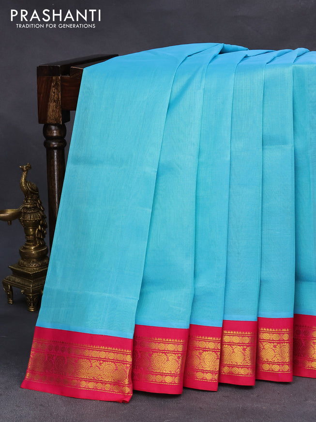 Silk cotton saree light blue and pink with plain body and zari woven korvai border