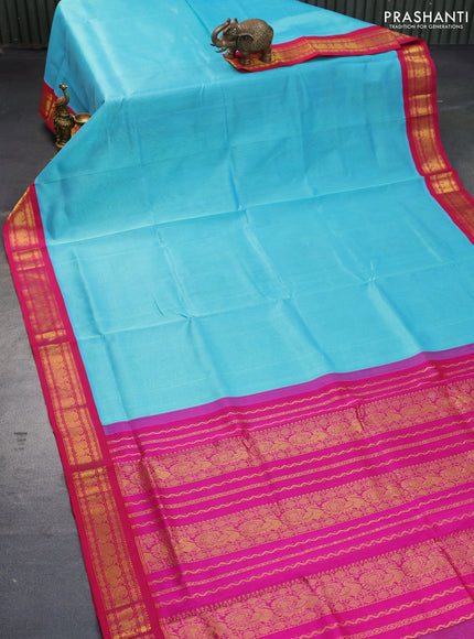 Silk cotton saree light blue and pink with plain body and zari woven korvai border