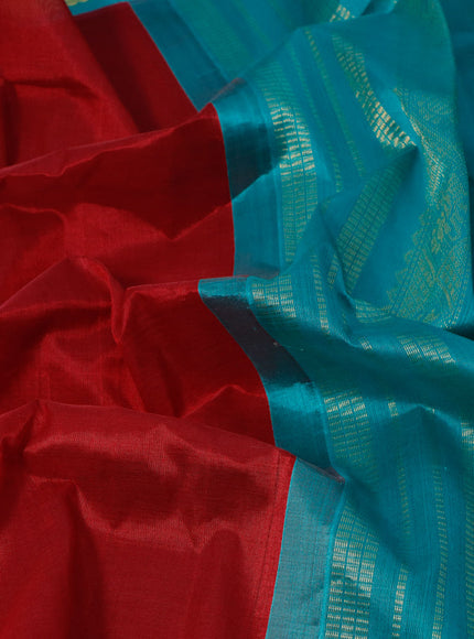 Silk cotton saree maroon and teal blue with plain body and zari woven korvai border