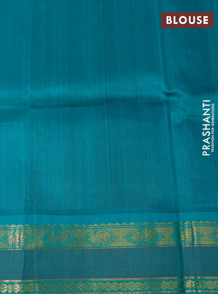 Silk cotton saree maroon and teal blue with plain body and zari woven korvai border