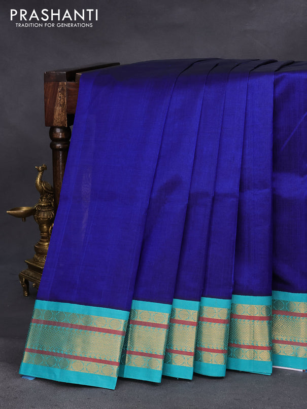 Silk cotton saree blue and teal blue with plain body and zari woven korvai border