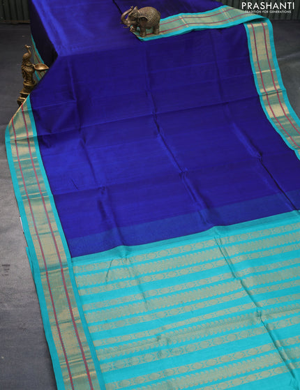 Silk cotton saree blue and teal blue with plain body and zari woven korvai border