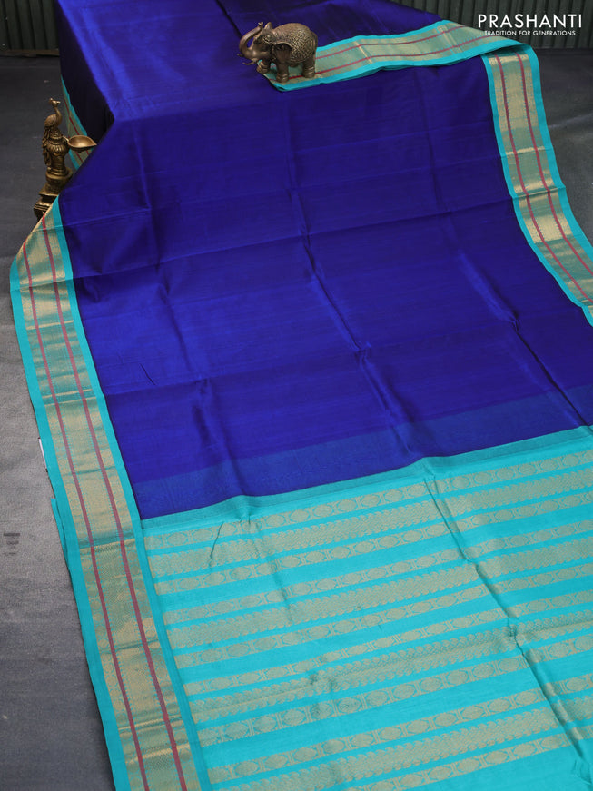 Silk cotton saree blue and teal blue with plain body and zari woven korvai border