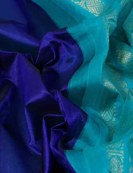 Silk cotton saree blue and teal blue with plain body and zari woven korvai border