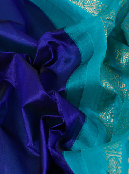 Silk cotton saree blue and teal blue with plain body and zari woven korvai border