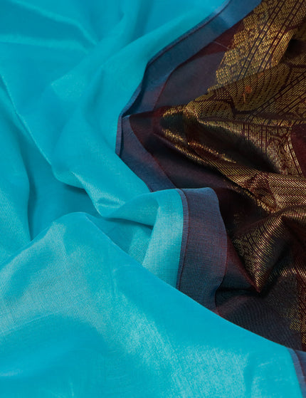 Silk cotton saree teal blue and coffee brown with plain body and zari woven korvai border