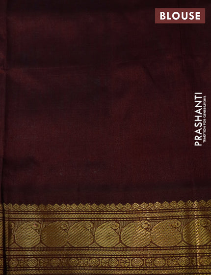 Silk cotton saree teal blue and coffee brown with plain body and zari woven korvai border