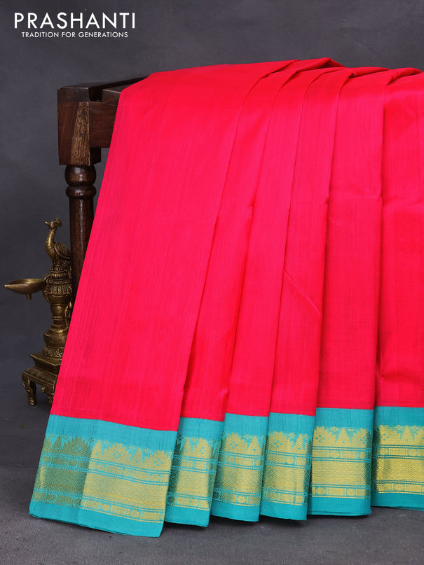 Silk cotton saree pink and teal blue with plain body and zari woven korvai border