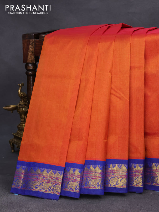 Silk cotton saree dual shade of rust and blue with plain body and zari woven korvai border