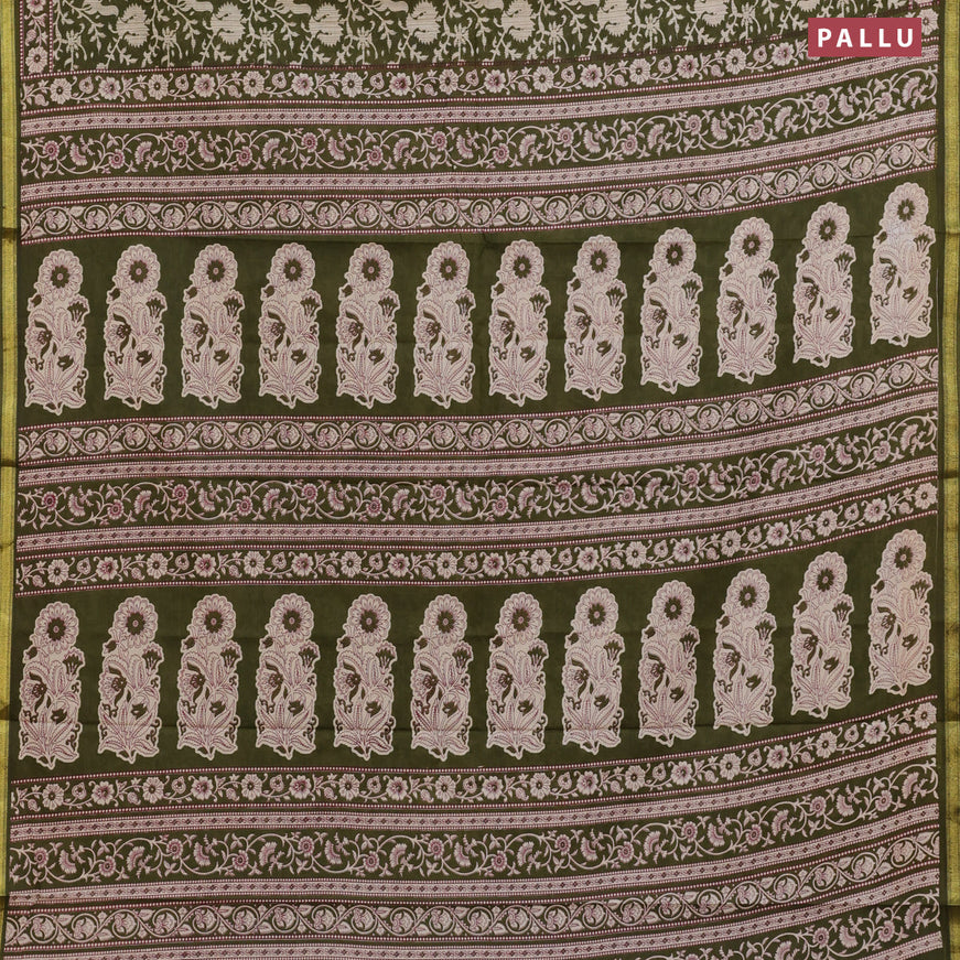 Muslin cotton saree sap green with allover prints and small zari woven border