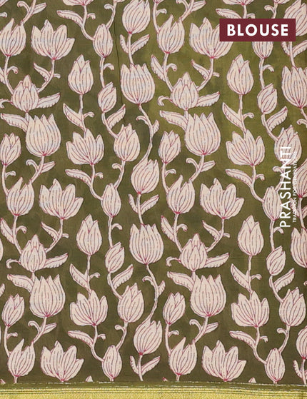 Muslin cotton saree sap green with allover prints and small zari woven border