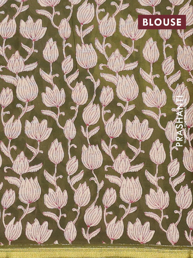 Muslin cotton saree sap green with allover prints and small zari woven border