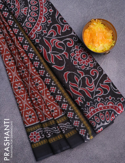 Muslin cotton saree rustic orange and black with allover ikat weaves and printed border