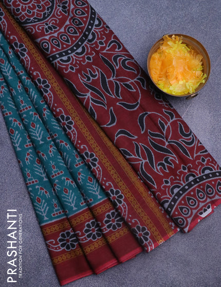 Muslin cotton saree teal green and maroon with allover ikat weaves and printed border