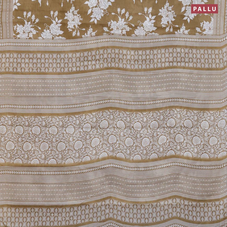 Muslin cotton saree khaki shade and off white with allover floral prints and printed border