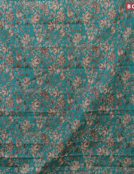 Muslin cotton saree teal green and grey with allover floral prints and zari woven border