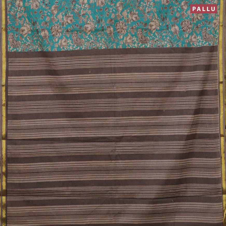 Muslin cotton saree teal green and grey with allover floral prints and zari woven border