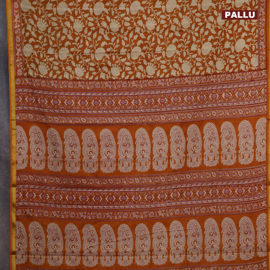 Muslin cotton saree dark bustard and beige with allover floral prints and small zari woven border