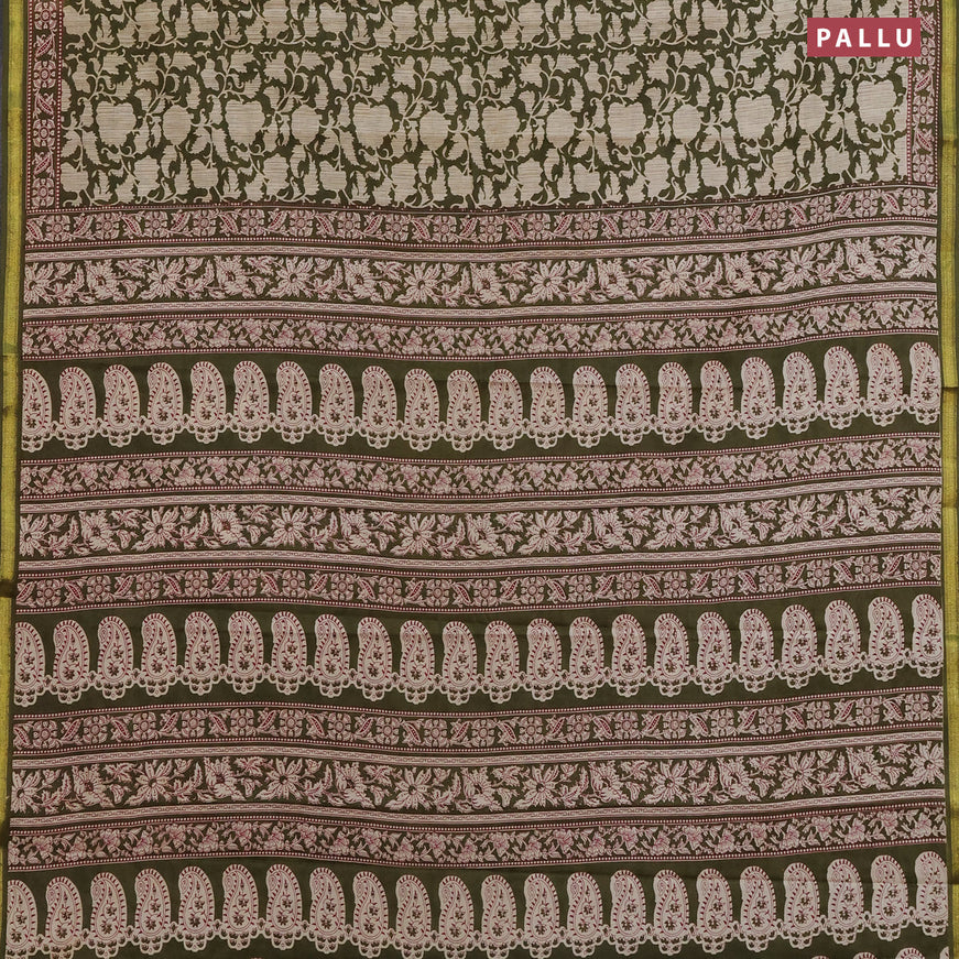 Muslin cotton saree sap green with allover prints and small zari woven border