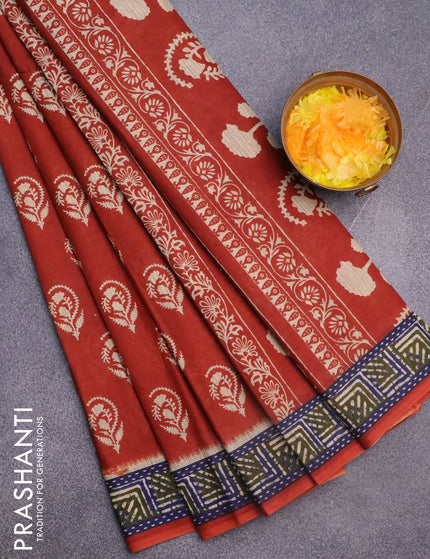 Muslin cotton saree rust shade with butta prints and printed border