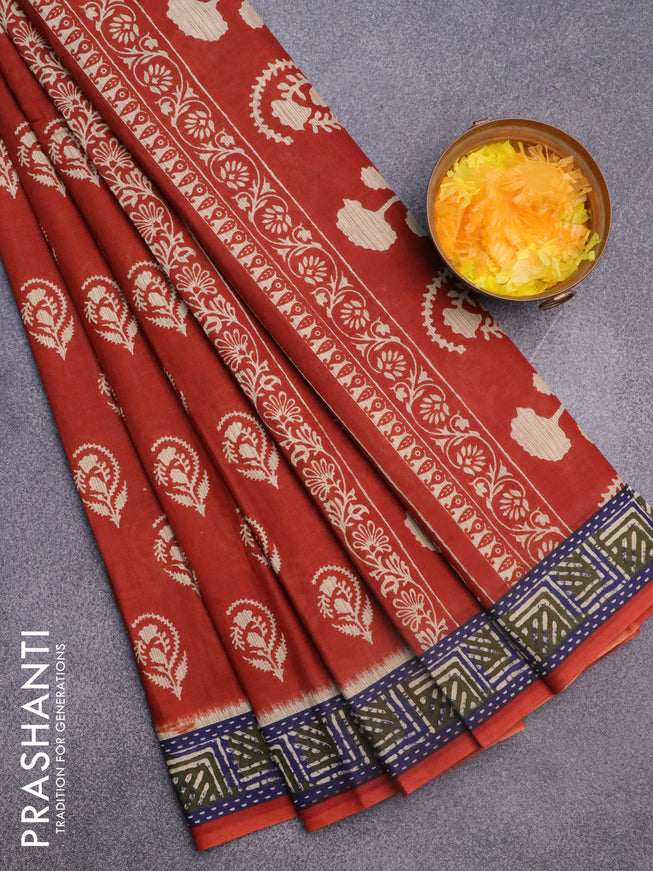 Muslin cotton saree rust shade with butta prints and printed border