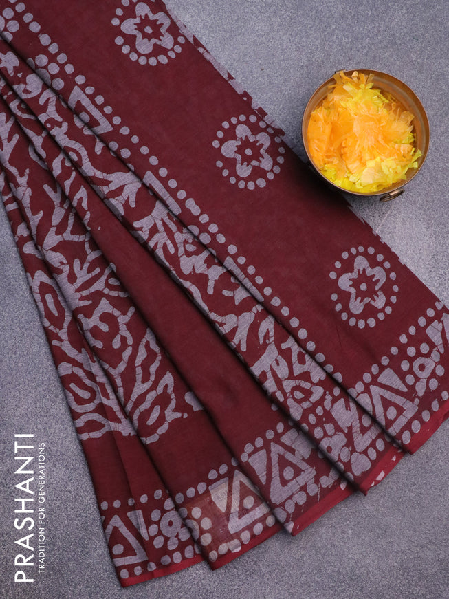 Muslin cotton saree maroon with allover batik prints and printed border