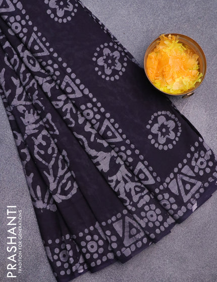 Muslin cotton saree dark blue with allover batik prints and printed border