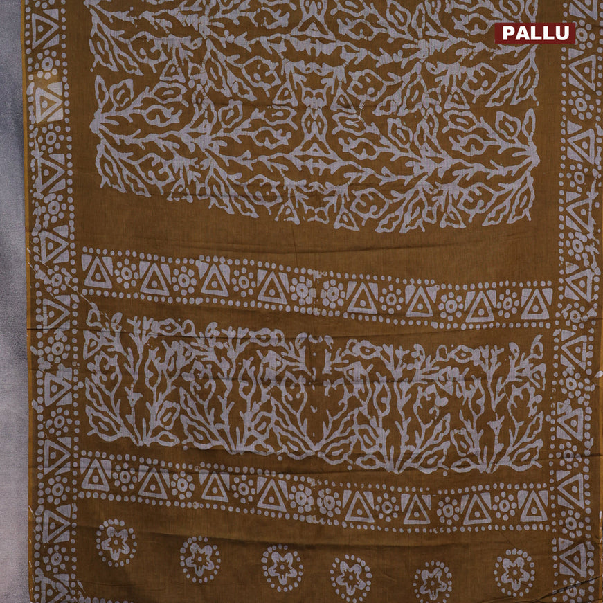 Muslin cotton saree dark mustard with allover batik prints and printed border