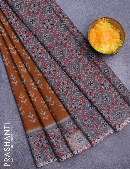 Muslin cotton saree dark mustard and grey with allover ikkat butta prints and printed border