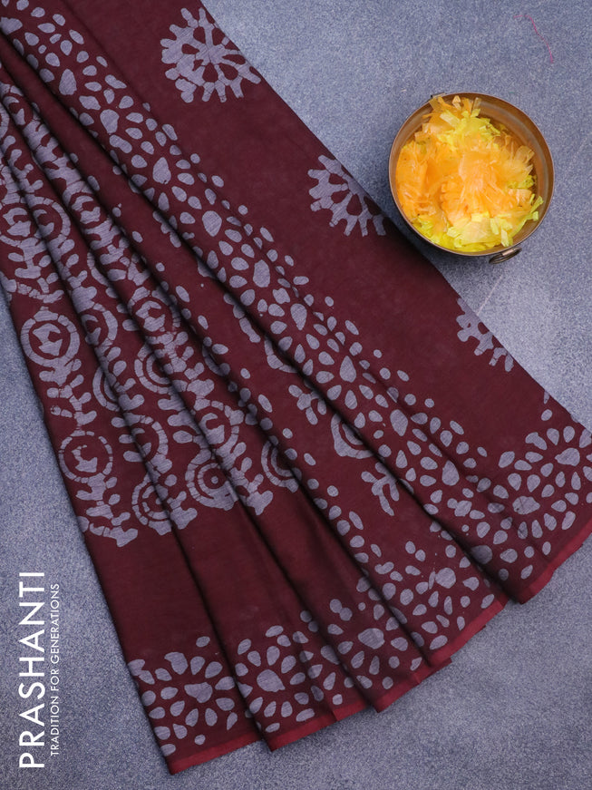 Muslin cotton saree dark maroon and grey with allover batik prints and printed border