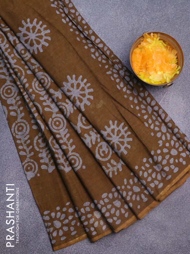 Muslin cotton saree dark mustard and grey with allover batik prints and printed border