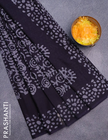 Muslin cotton saree dark blue and grey with allover batik prints and printed border