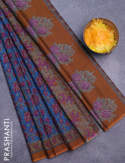 Muslin cotton saree cs blue and dark mustard with allover floral prints and printed border