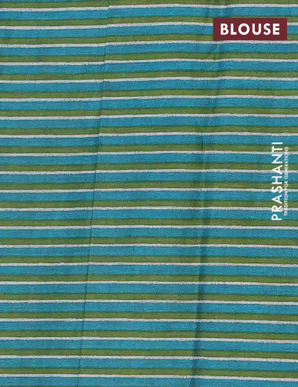 Muslin cotton saree sap green and teal green with allover floral prints and printed border