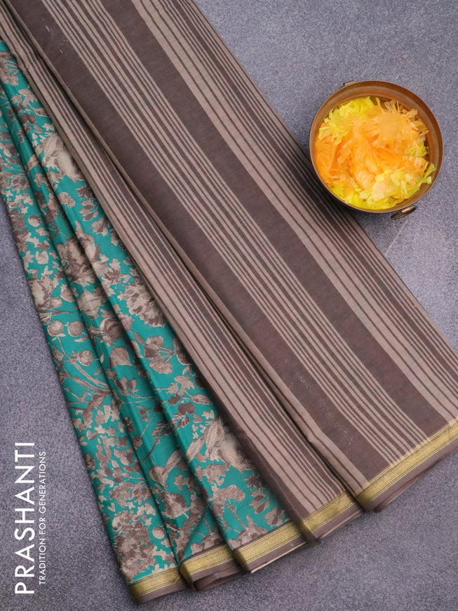 Muslin cotton saree teal green and grey with allover floral prints and small zari woven border