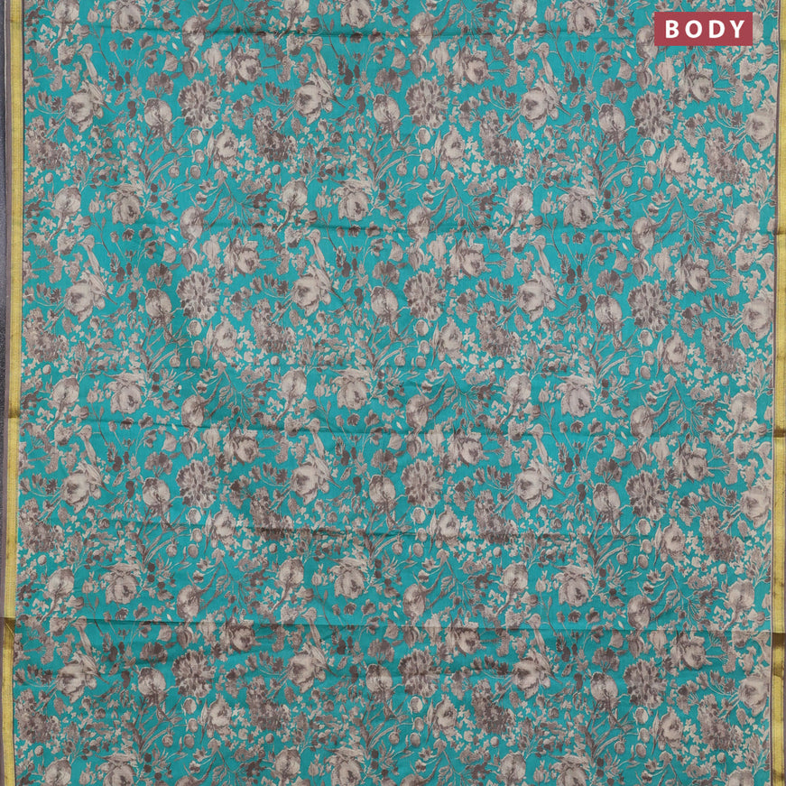 Muslin cotton saree teal green and grey with allover floral prints and small zari woven border