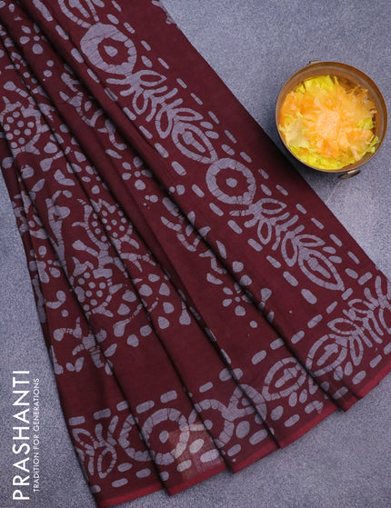 Muslin cotton saree dark maroon and grey with allover batik prints and printed border